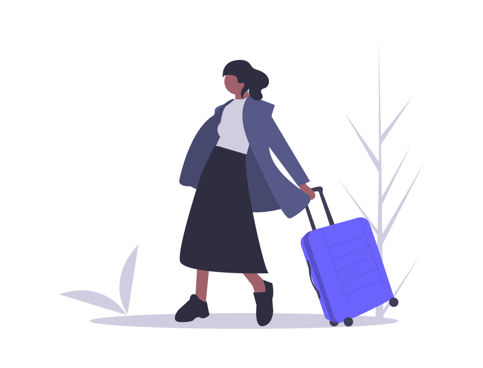 女性とスーツケースの写真